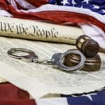 Constitution, Gavel and handcuffs