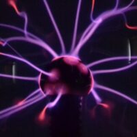 Closeup shot of a colorful plasma ball on a black background